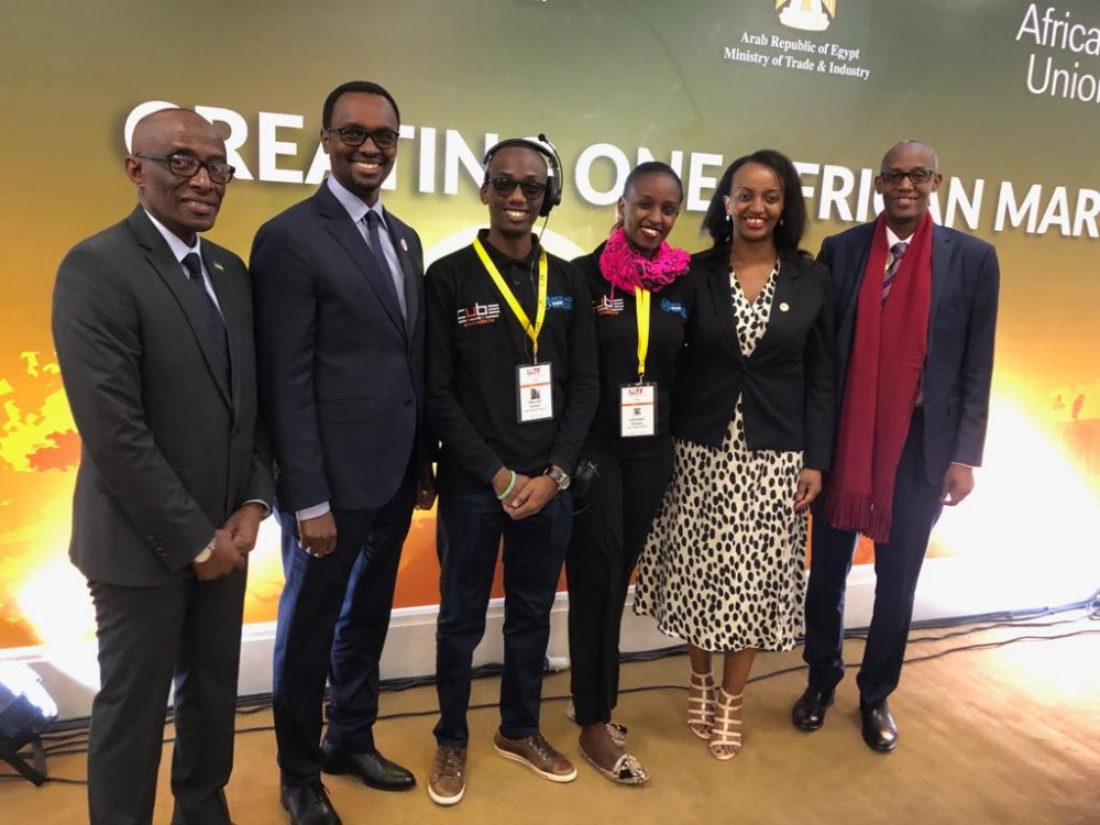 From Left; Ambassador Sheikh Saleh Habimana; the Chief Operating Officer at Rwanda Development Board (RDB), Emmanuel Hategeka; Minister of Trade and Industry, Soraya Hakuziyaremye (Middle from right) and the Chief Executive Officer (CEO) of the Private Sector Federation (PSF), Stephen Ruzibizi with two Rwandan assistants at the trade Fair