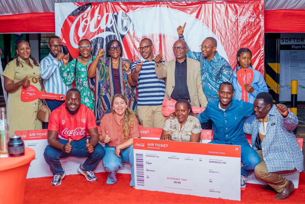 Top performers posing for a group photo with the management team of BRALIRWA Plc