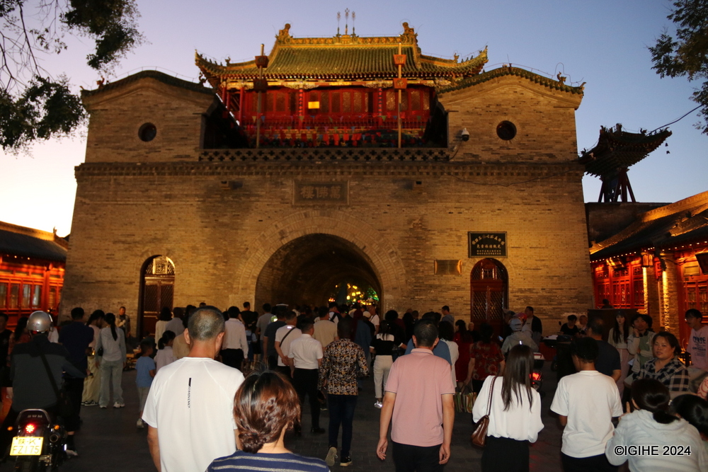 The ancient buildings and structures that line the street offer a glimpse into the architectural brilliance of past dynasties.