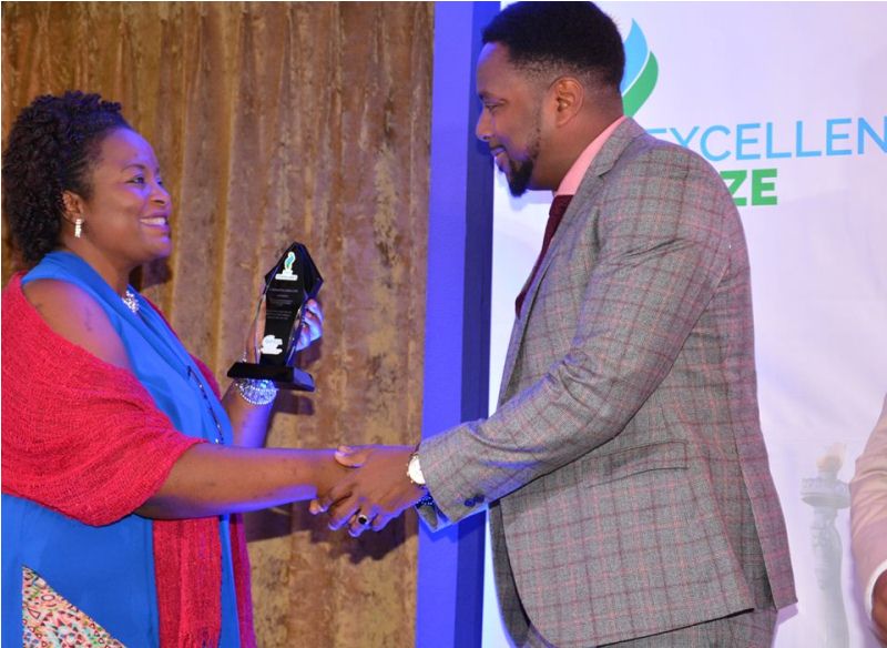 Patrick Shema Gateja receiving the award