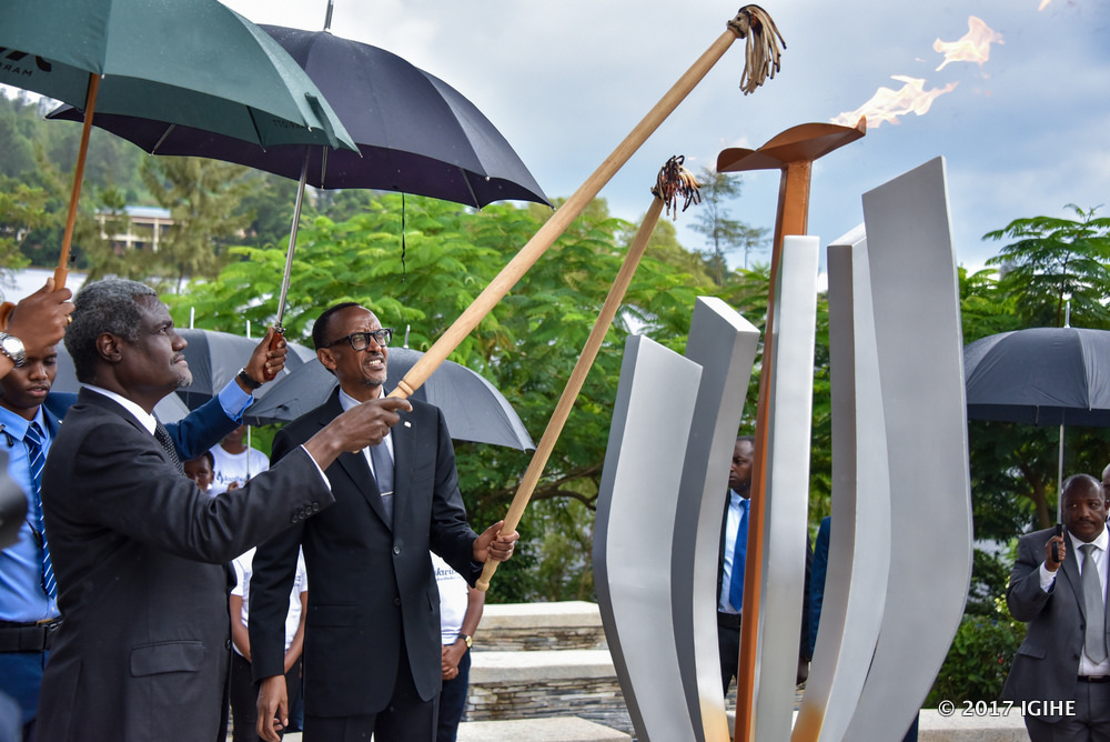 President Paul Kagame and the African Union Commission Chairperson, Moussa Faki Mahamat lighting the flame of hope yesterday at Gisozi memorial.