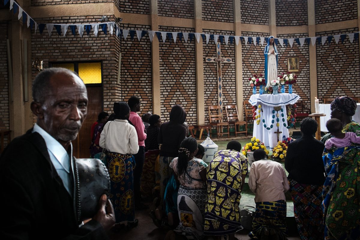 Catholic Church faithful pray in Our Lady of Kibeho shrine.