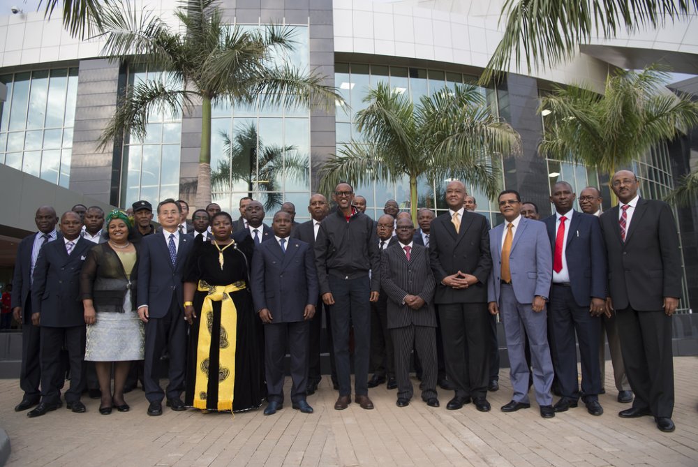 President Paul Kagame in a group photo with representatives of other political parties invited to attend RPF Inkotanyi congress.