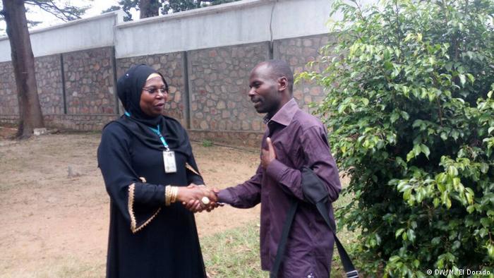 Niragira (right) seen with another DW correspondent following his release