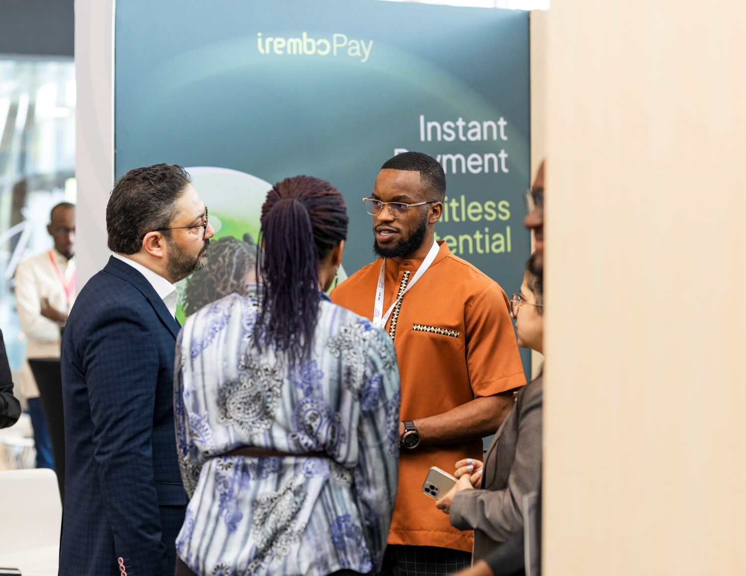 An IremboPay representative explains to IFF delegates how the platform simplifies payment.