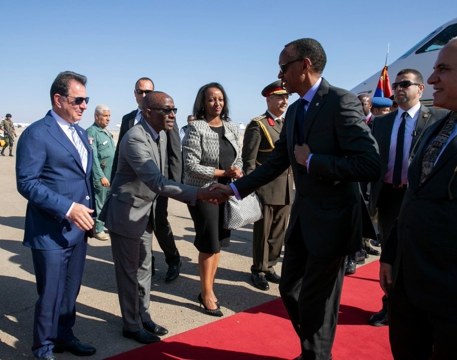 President Kagame greeting Ambassador Sheikh Saleh Habimana while in Egypt
