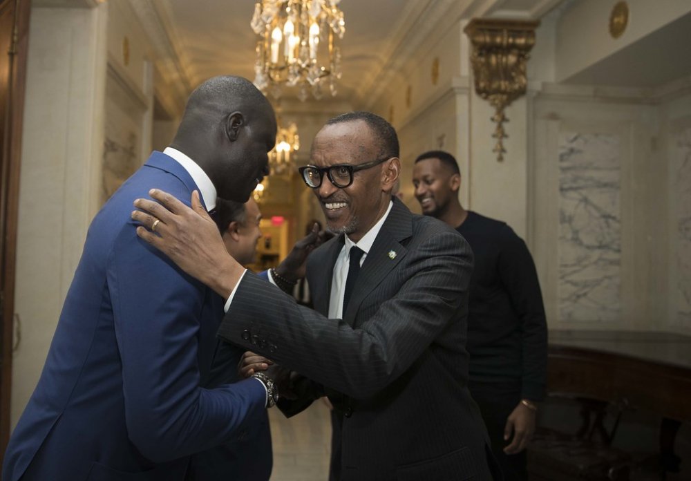NBA Africa VP Amadou Fall greeting the president Kagame