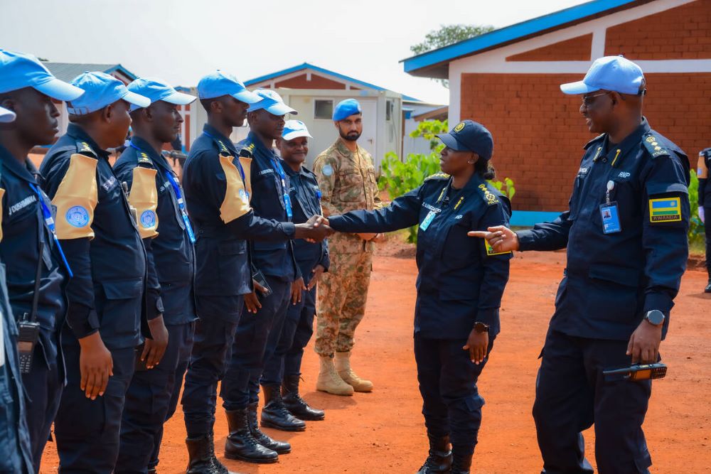 DCG Ujeneza interacting with Rwandan Police peacekeepers in CAR.