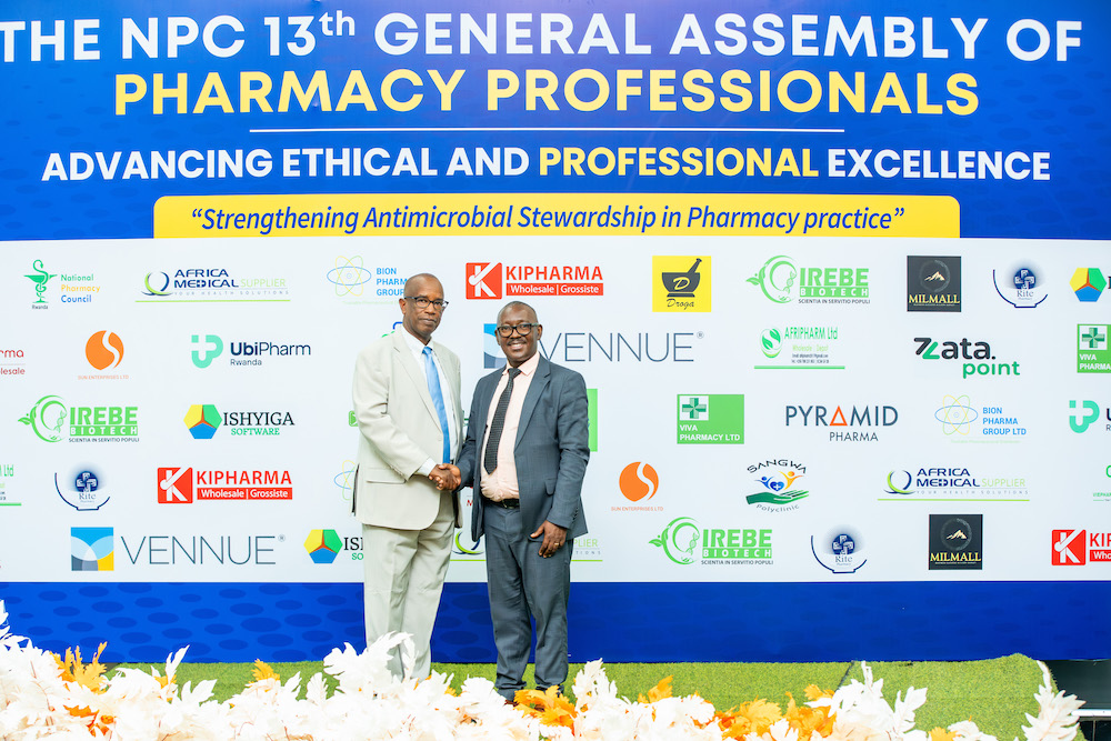 The outgoing Chairperson, DCG (Rtd) Stanley Nsabimana with his successor Prof. Egide Kayitare.