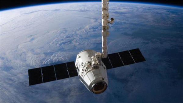 The SpaceX Dragon cargo capsule approaches the International Space Station prior to installation in this NASA picture taken April 10, 2016.