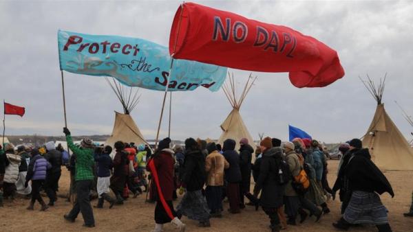 Hundreds of Native Americans and solidarity activists are camping to block a pipeline