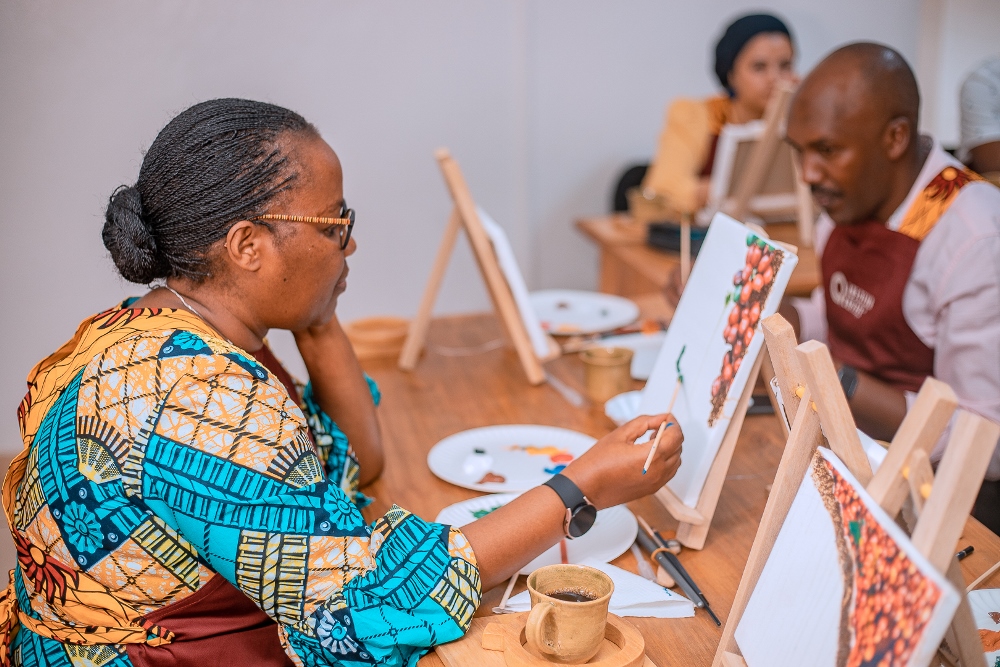 Minister Mukeshimana also joined participants to paint coffee trees as Rwanda marked the International Coffee Day.