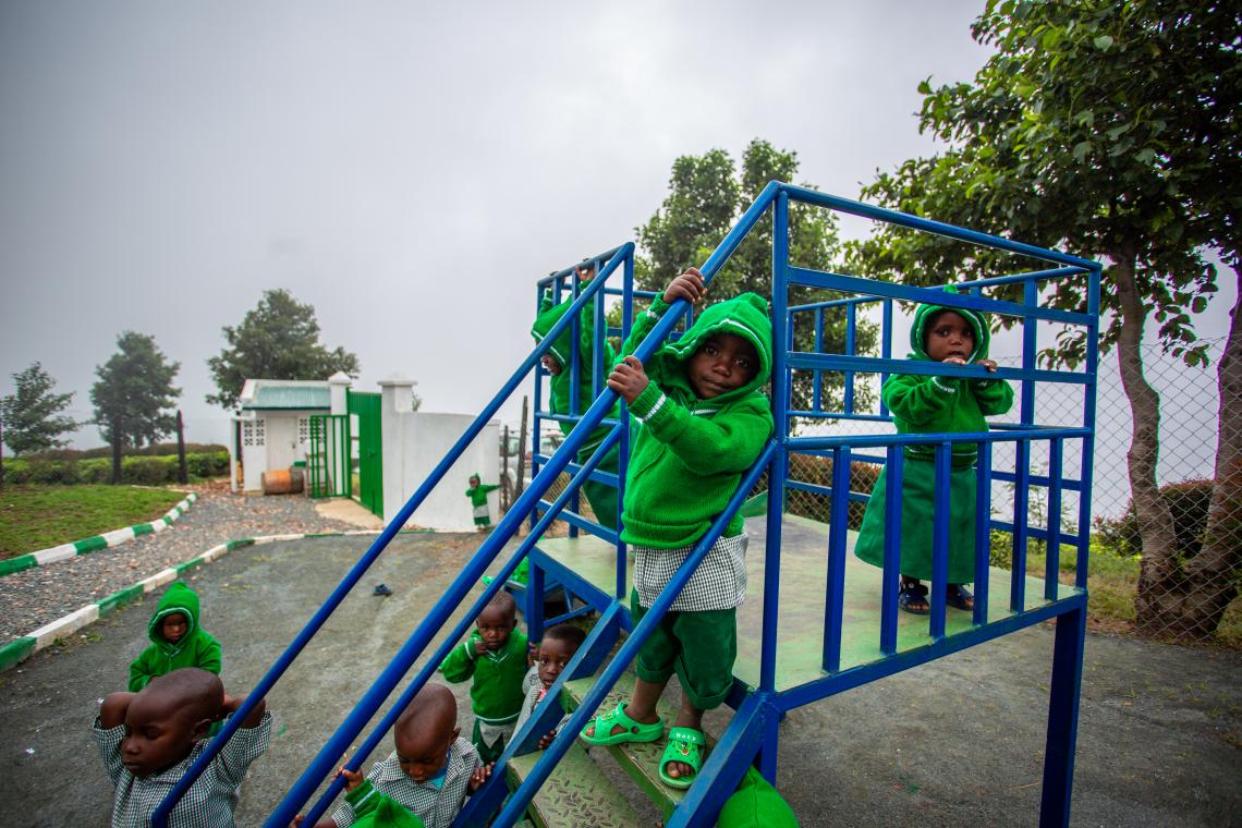 Children play outside at the Rutsiro Tea Plantation day care centre.