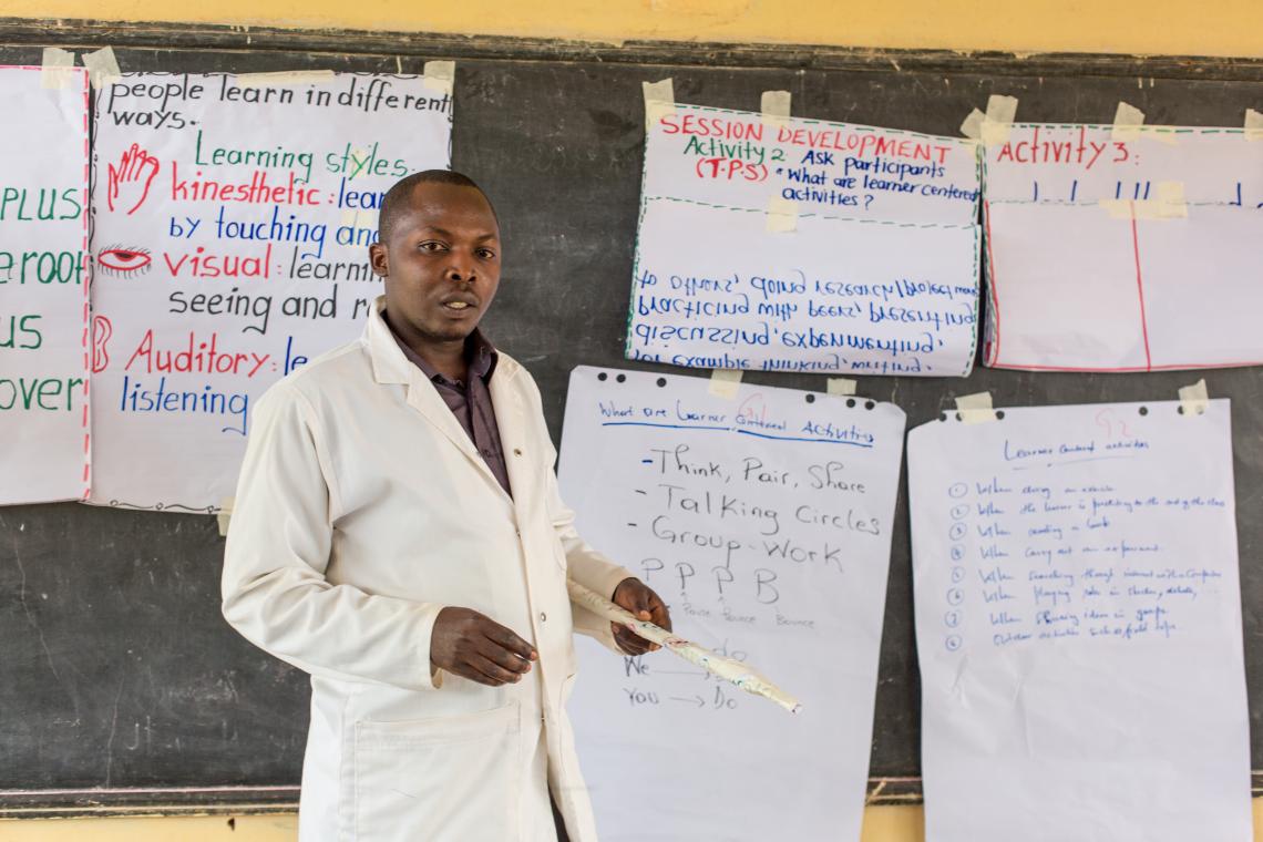 Vedaste Muziramacyenga, a teacher-mentor in Rwanda's Zaza Sector, coaches his fellow teachers on developing student-centred classroom activities.