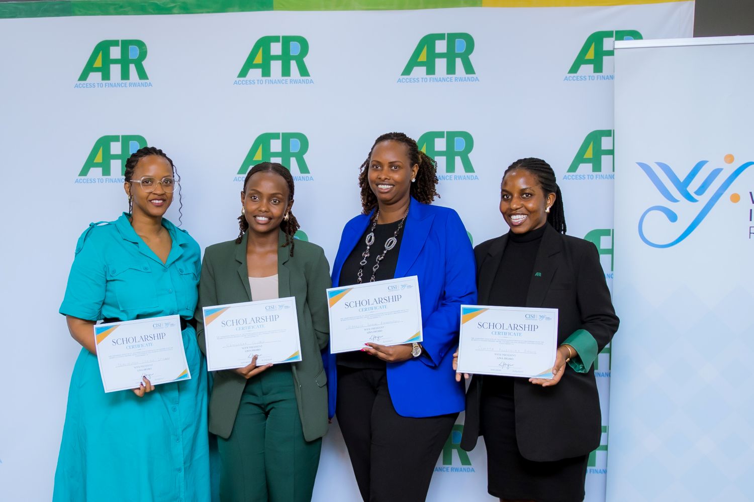 The four young female employees of Access to Finance Rwanda (AFR) all smiles after being awarded CISI professional development scholarships.