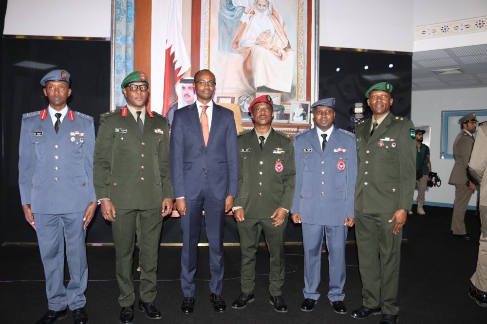 Lt Col Martin Mbonimpa (second right) serves in Air Force Regiment while Major John Kalisa (third right) serves in Special Force unit.
