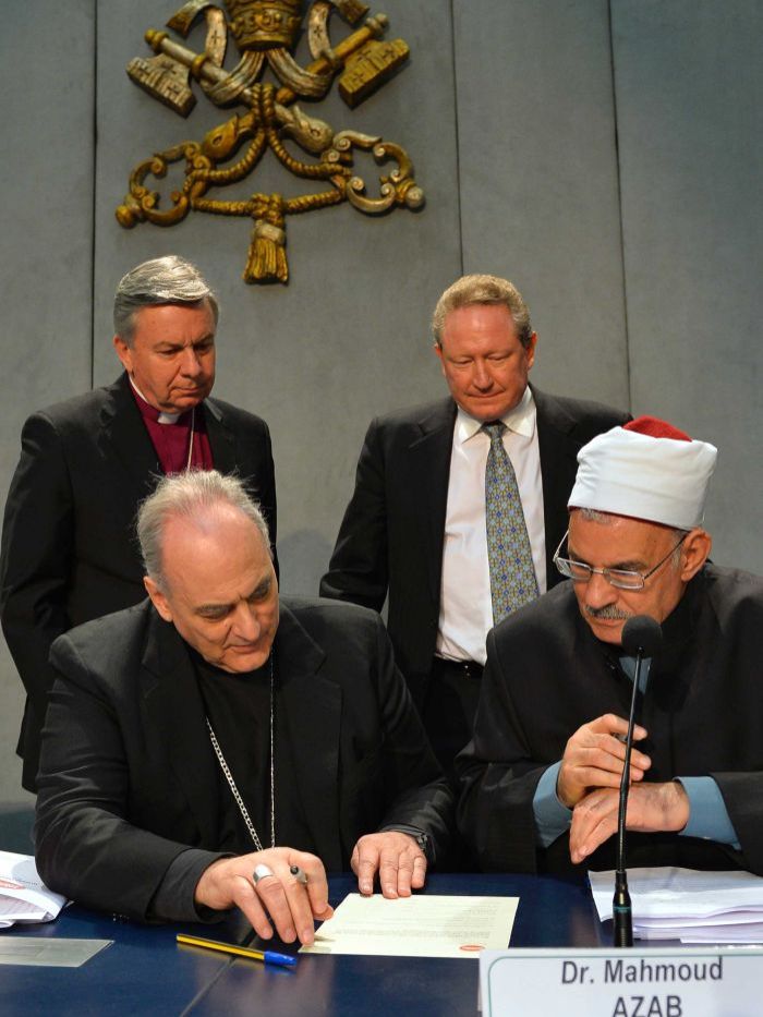 Bishop Marcelo Sánchez Sorondo (bottom left) signed the agreement aimed at ending slavery last year. AFP: Andreas Solaro