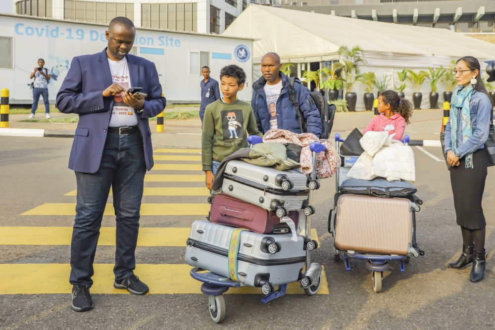 Younga's wife and children arrived at Kigali International Airport on Saturday morning. 