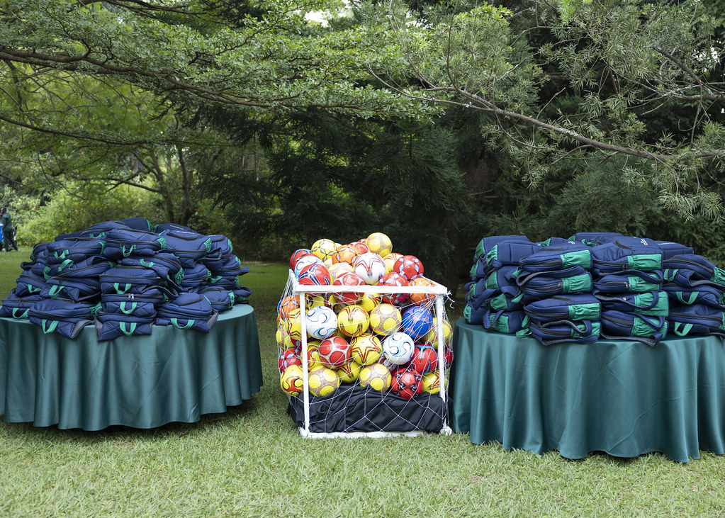 The children went home with gifts, including school bags and footballs.