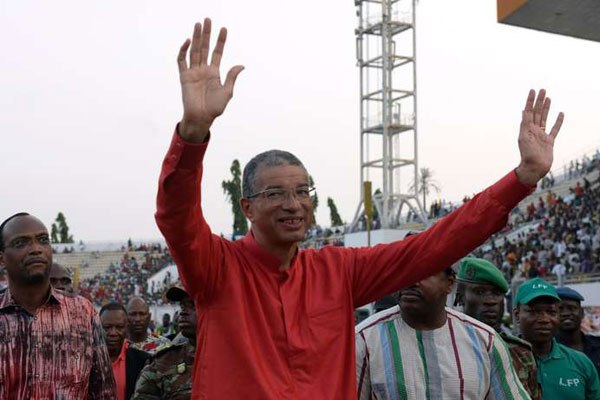 Prime Minister and presidential candidate of the ruling Cowry Forces for an Emerging Benin party Lionel Zinsou waving to supporters at the stadium in Cotonou.