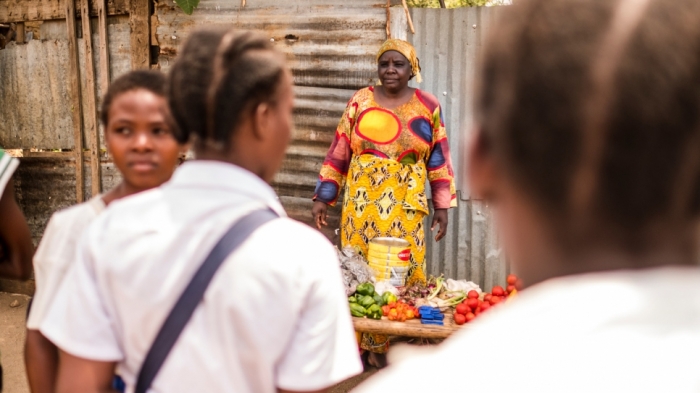 Rehema Kankindi, a Burundian refugee, sells vegetables on a street stall in Uvira, Democratic Republic of the Congo. She fled across the border in 2015 after her stepson and two of her sons were killed in Burundi.