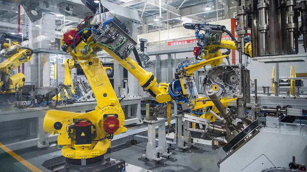 Robots work on an assembly line of aluminium vehicle body in Zouping, east China's Shandong Province, Sept. 13, 2023. (Xinhua/Guo Xulei)