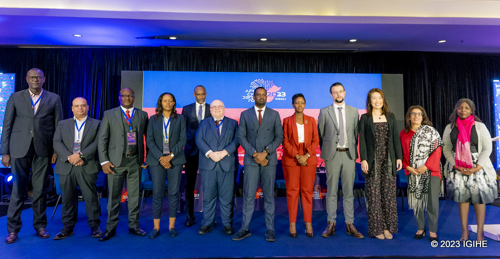 Minister Paula Ingabire with delegates and partners of ACDF in a group photo on the first day of the forum.
