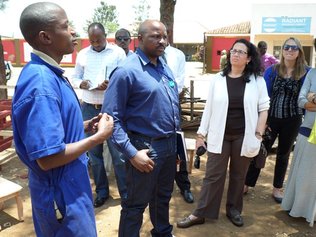 Ntamugabumwe Faustin (in Blue) is a graduate of Akazi Kanoze. He has a Soldering Workshop in Bugesera and he has employed Three other Youth