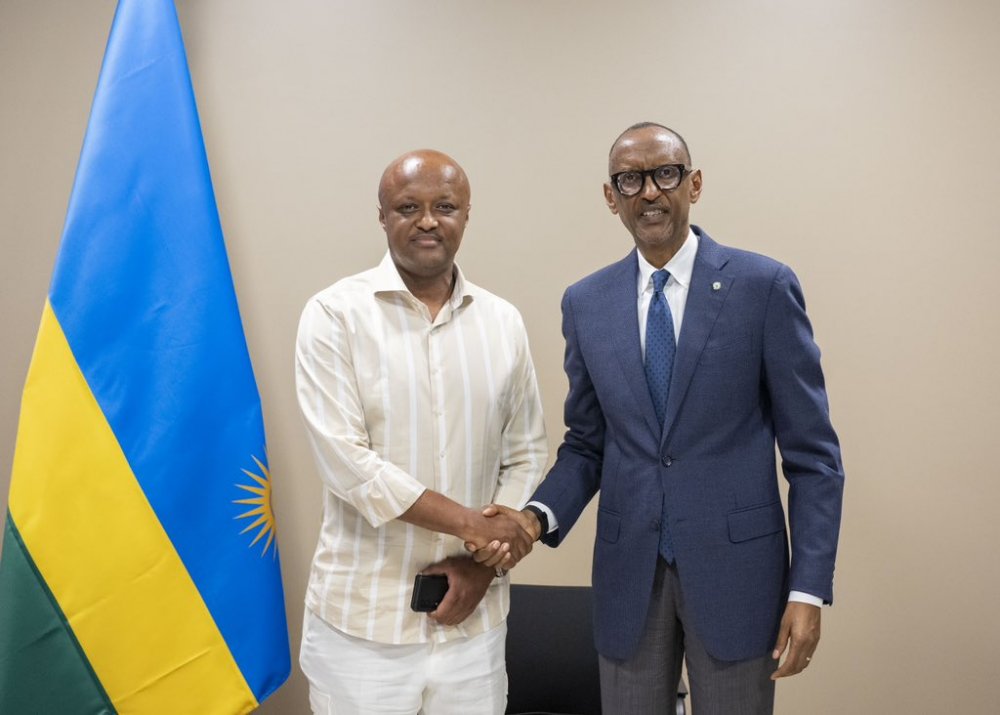 President Kagame with football legend, Jimmy Gatete. 