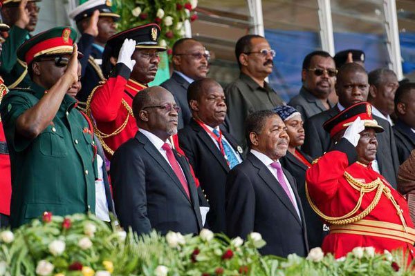 Tanzanian President John Magufuli (second left) and Zanzibar's newly elected President Ali Mohamed Shein (second right) during Mr Shein's swearing-in ceremony in Stone Town, Zanzibar, on March 24, 2016.