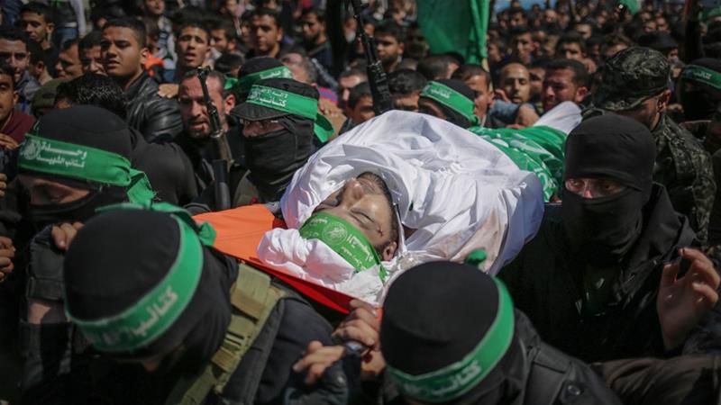 Thousands poured into the streets of Gaza for the funeral of Mazen Faqha