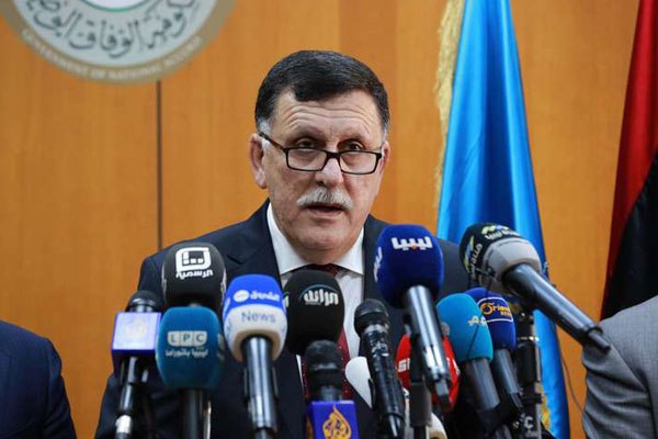 Libya's UN-backed Prime Minister-designate, Fayez al-Sarraj, speaks during a press conference on March 30, 2016 in the capital Tripoli. In a sign of its widening influence, Fayez al-Sarraj's administration took over the website of the unrecognised Tripoli authorities on Thursday.
