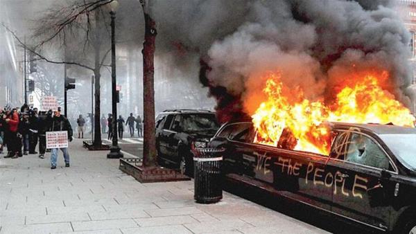 A limousine was set on fire and some buildings were damaged during the protests in DC