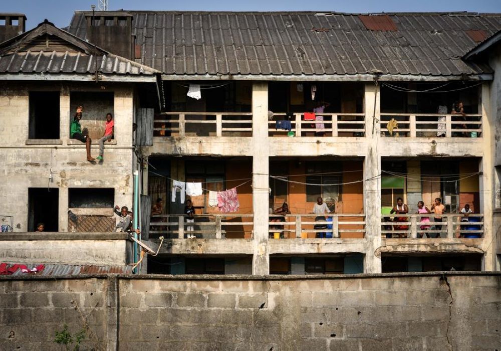 People are seen from a building in Lagos, Nigeria, Feb. 28, 2024. According to the study, the 4.2 billion dollars in losses occasioned by negative media coverage annually could fund the education of 12 million African children, and provide immunization to over 73 million children, higher than the combined populations of Angola and Mozambique. (Xinhua/Han Xu)