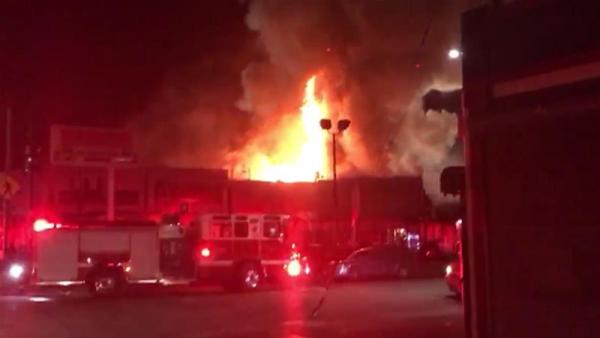 Police say dozens of people were inside the building when the blaze started