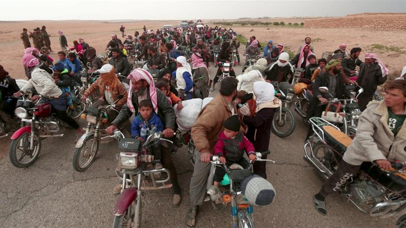 People fleeing from areas surrounding Euphrates River dam, east of Raqqa city 