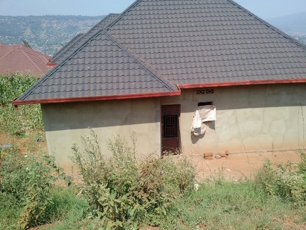 The house in which the unidentified man's body has been found.