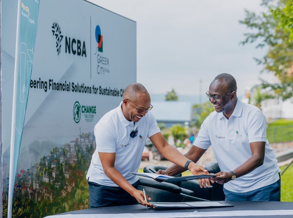 Basil Karimba, CEO of GCK and Maurice Toroitich, Managing Director of NCBA Rwanda signing the agreement.