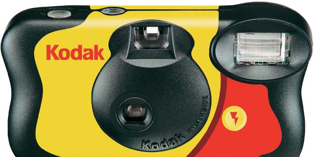 Disposable Cameras, 1990s | disposable cameras gained popularity in the 1990s, earning a place of honor at weddings to allow guests to take photos throughout the reception