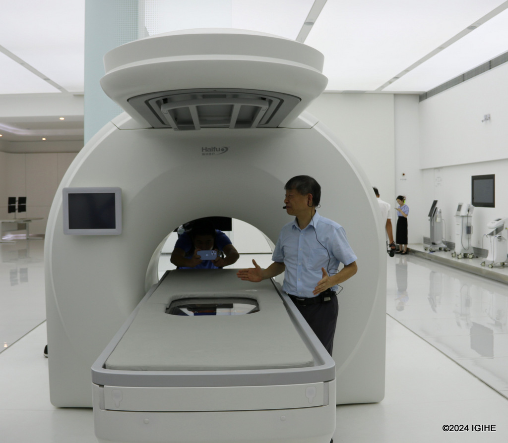 The President and Co-founder of Haifu Medical Technology, Zhibiao making introducing the Haifu Focused ultrasound system at the company's headquarters in Chongqing Municipality.  
