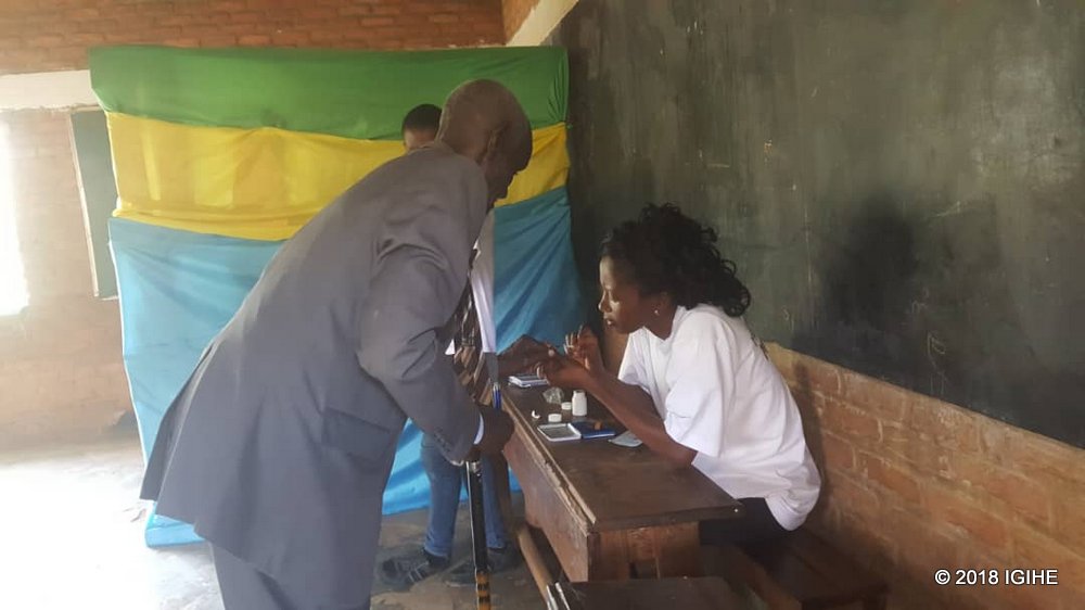 Rachid Mugemana aged 75, voting in Parliamentary Elections