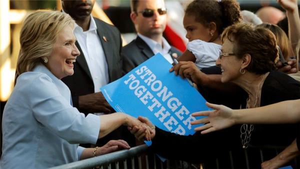 Hillary Clinton leads Donald Trump in polls by some four percentage points