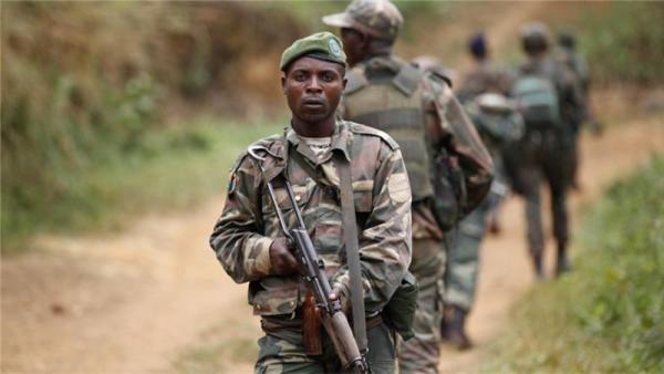 Democratic Republic of Congo military personnel patrol against the Allied Democratic Forces near Beni.