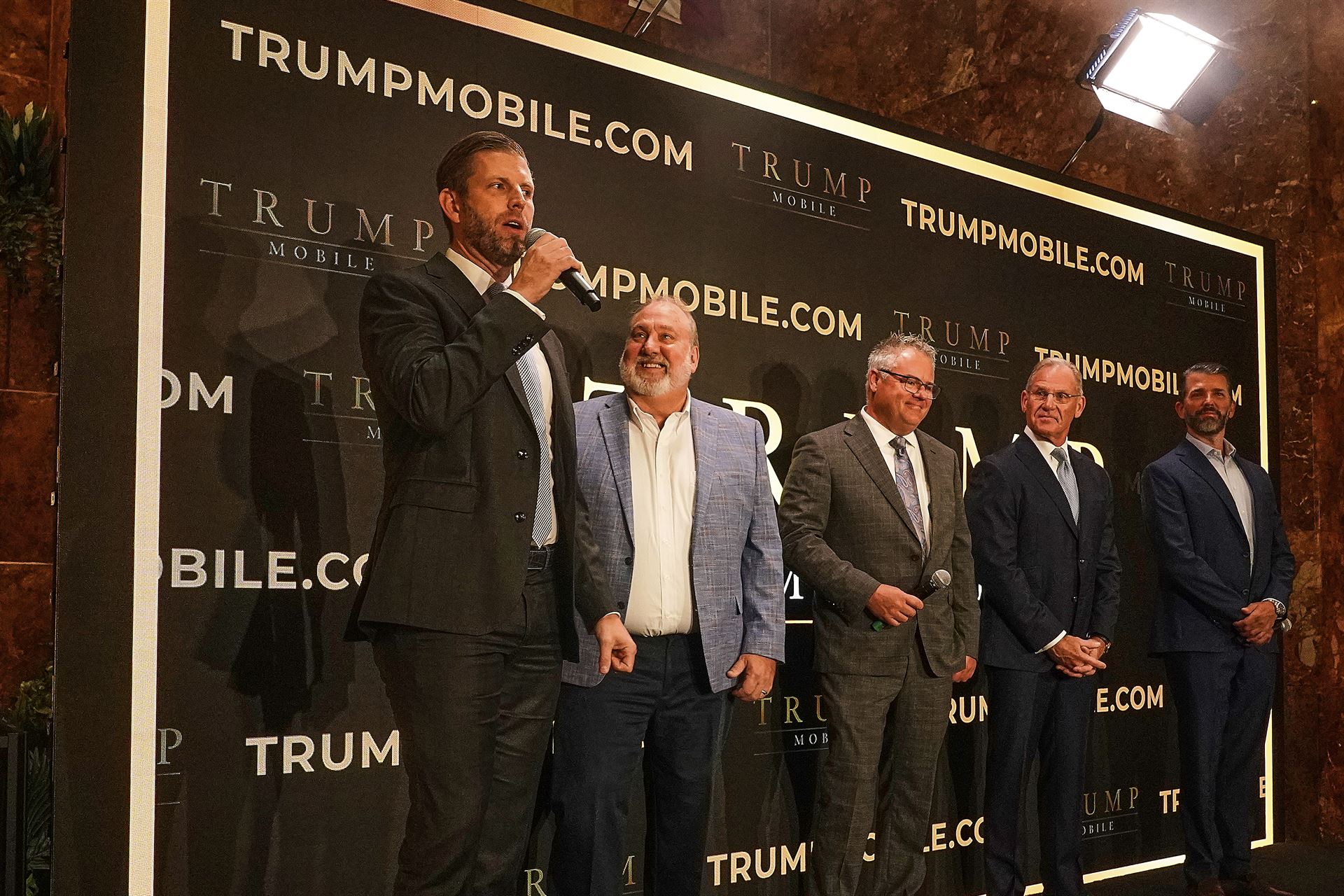 (From left) Eric Trump, Don Hendrickson, Eric Thomas, Patrick O'Brien and Donald Trump Jr, participate in the announcement of Trump Mobile, in New York's Trump Tower, June 16, 2025.