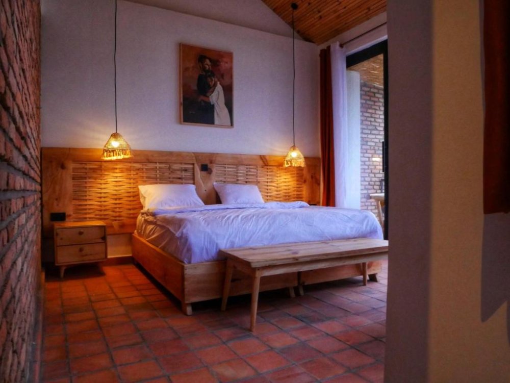 The bungalows feature cozy bedroom.