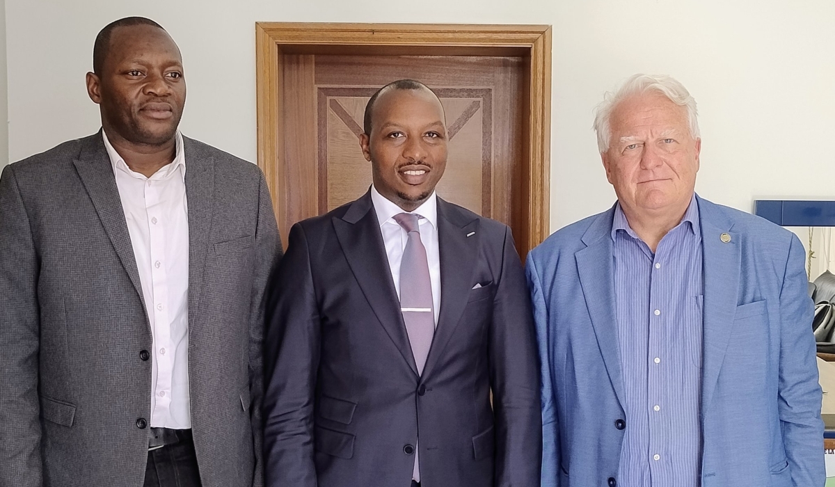 Former German ambassador to Rwanda Peter Fahrenholtz (right), North Kivu Deputy Governor Willy Manzi (centre) and AFC/M23 spokesperson Lawrence Kanyuka pose for a photo in Goma.