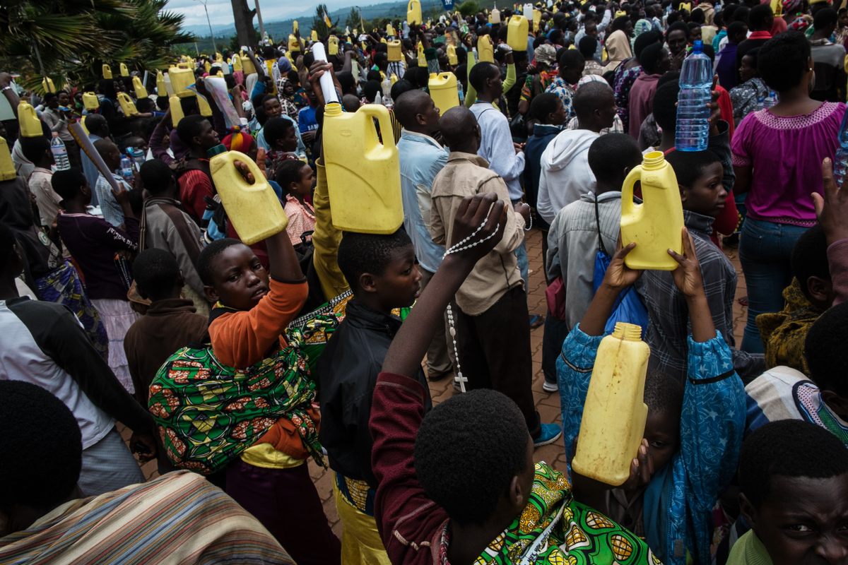 Pilgrims collect it in jerry cans, have it blessed by the priest, and take it with them when they depart