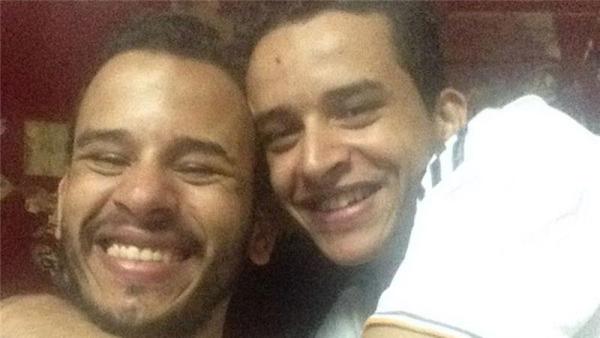 Following his release Mahmoud Hussein, right, hugs his brother Tito who campaigned for his sibling's freedom