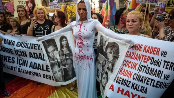 More than 200 demonstrators carried banners saying "justice for Hande Kader" and "let's fight for our survival"
