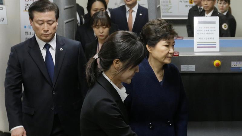 Park leaves after a hearing on a prosecutors' request for her arrest for corruption in Seoul